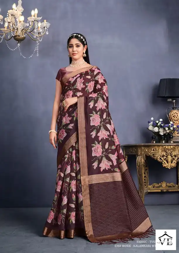Peach fancy tussar saree printed with intricate & colorful motifs on its  body,contrast plain border & pallu with tassels